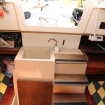 close up of sink and companionway steps